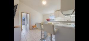 Kuchnia lub aneks kuchenny w obiekcie Aurum luxury apartments