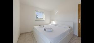 Łóżko lub łóżka w pokoju w obiekcie Aurum luxury apartments
