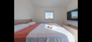 Łóżko lub łóżka w pokoju w obiekcie Aurum luxury apartments
