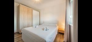 Łóżko lub łóżka w pokoju w obiekcie Aurum luxury apartments