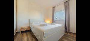 Łóżko lub łóżka w pokoju w obiekcie Aurum luxury apartments