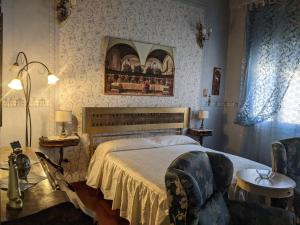 A bed or beds in a room at D'Elite Room & Breakfast Még 37 kép