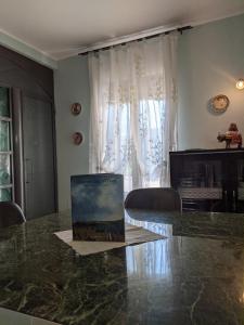 A television and/or entertainment centre at D'Elite Room & Breakfast