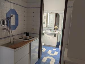 A kitchen or kitchenette at D'Elite Room & Breakfast