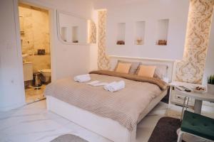 Łóżko lub łóżka w pokoju w obiekcie Villa Fortuna