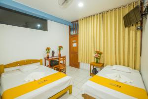 Postel nebo postele na pokoji v ubytování Hotel Boulevard