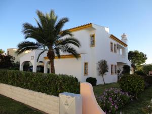 a house with a skateboard ramp in front of it at Villa Cavaco in Vilamoura