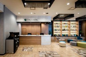 a store with a counter and chairs in a lobby at Chisun Hotel Kamata in Tokyo