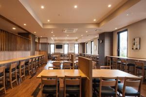 Restoran atau tempat lain untuk makan di Hotel Route-Inn Isesaki Inter