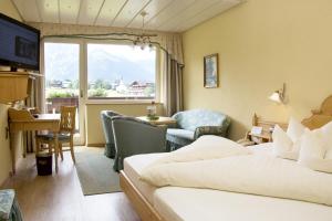 Postelja oz. postelje v sobi nastanitve Hotel Post am See