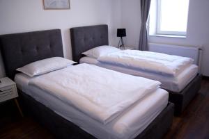 Postel nebo postele na pokoji v ubytování Style Hotel