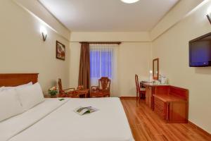 TV a/nebo společenská místnost v ubytování Khách sạn Park Hotel Dalat