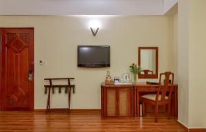 TV a/nebo společenská místnost v ubytování Khách sạn Park Hotel Dalat