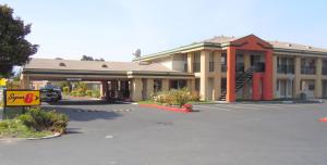 a parking lot in front of a building at Super 8 by Wyndham Salinas in Salinas