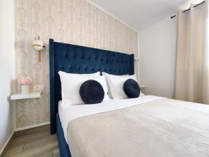 Katil atau katil-katil dalam bilik di Bloom Apartments