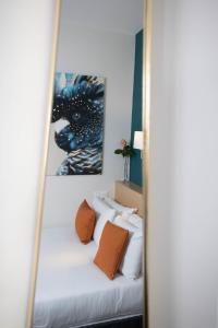 Cama ou camas em um quarto em Hotel Continental