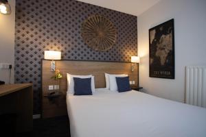 Cama ou camas em um quarto em Hotel Continental