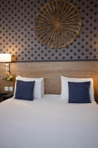 Cama ou camas em um quarto em Hotel Continental