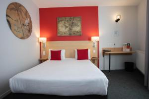 Cama ou camas em um quarto em Hotel Continental