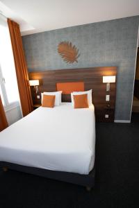 Cama ou camas em um quarto em Hotel Continental