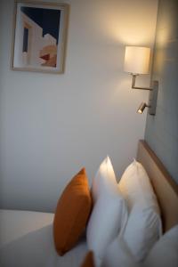 Cama ou camas em um quarto em Hotel Continental