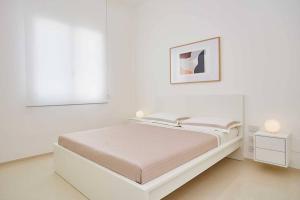 Posteľ alebo postele v izbe v ubytovaní VILLA DARDA con piscina e 3 camere da letto