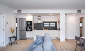 Kuchyň nebo kuchyňský kout v ubytování Apartaments La Rosella