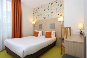 Cama ou camas em um quarto em Hotel Continental