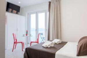 Postel nebo postele na pokoji v ubytování Anreale Rooms Agropoli
