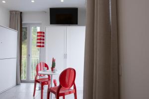 TV a/nebo společenská místnost v ubytování Anreale Rooms Agropoli