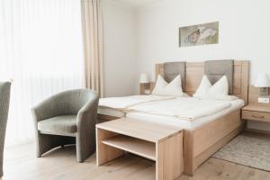 Postel nebo postele na pokoji v ubytování Bio-Hotel Melter + 35 fotografií