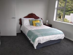 A bed or beds in a room at Quiet location with view and public transport