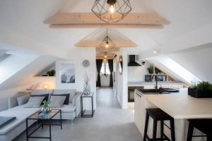 a kitchen and living room in a loft conversion at House 24 Bled in Bled