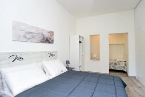 Voodi või voodid majutusasutuse Il Caubbio toas