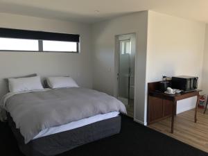 Voodi või voodid majutusasutuse Stylish Space toas