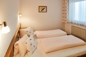 Postel nebo postele na pokoji v ubytování Appartements Sailer