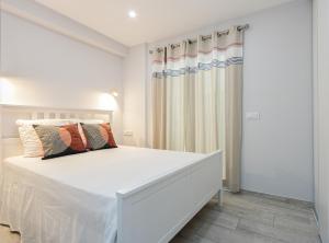 Posteľ alebo postele v izbe v ubytovaní CENTRAL APARTMENT 2A 50m BEACH