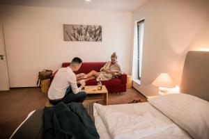 Postel nebo postele na pokoji v ubytování Hotel & Garden U Holubů