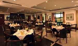 A restaurant or other place to eat at Renest Gandhidham