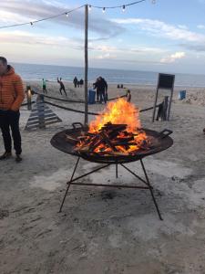 Gril dostupný pro hosty v apartmánu