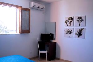 TV a/nebo společenská místnost v ubytování B&B Villa Francesco