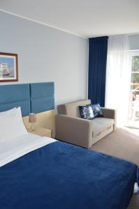Postel nebo postele na pokoji v ubytování B&B Landrynka