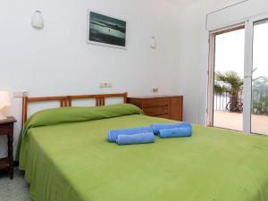 A bed or beds in a room at Apartment Cambre d'Aze by Interhome
