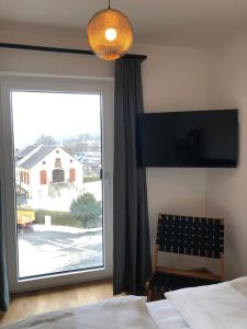 Postel nebo postele na pokoji v ubytování Ski & Nature Apartment