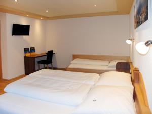 Ένα ή περισσότερα κρεβάτια σε δωμάτιο στο Holiday Home Apart Garni Niederhof - KPL119 by Interhome
