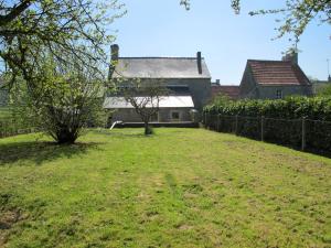 an empty yard in front of a house at Holiday Home Le Repos by Interhome in Commes