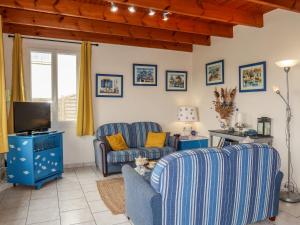 Μια τηλεόραση ή/και κέντρο ψυχαγωγίας στο Holiday Home Pors Bae by Interhome +17 φωτογραφίες