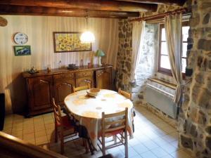 A restaurant or other place to eat at Holiday Home Le Haut d'Ancette - AJA100 by Interhome