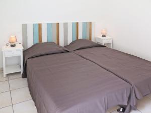 Postel nebo postele na pokoji v ubytování Holiday Home Résidence Plage Océane-1 by Interhome