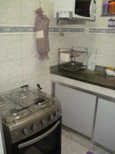 Küche/Küchenzeile in der Unterkunft Apart Marcelo - Lapa/Rezende